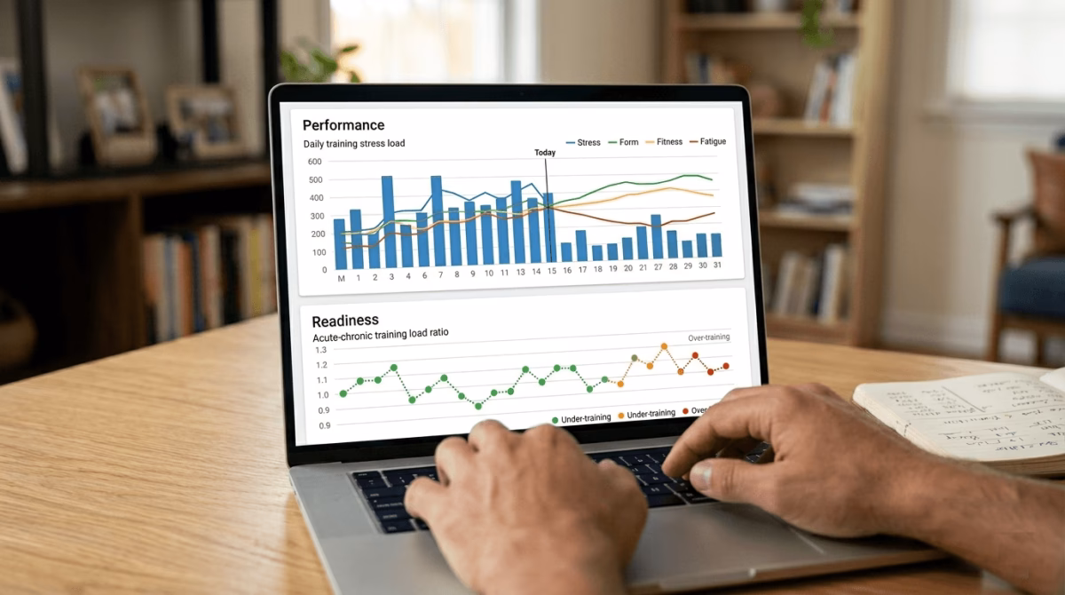 Hands typing on laptop displaying EndoGusto performance dashboard to predict marathon finish time